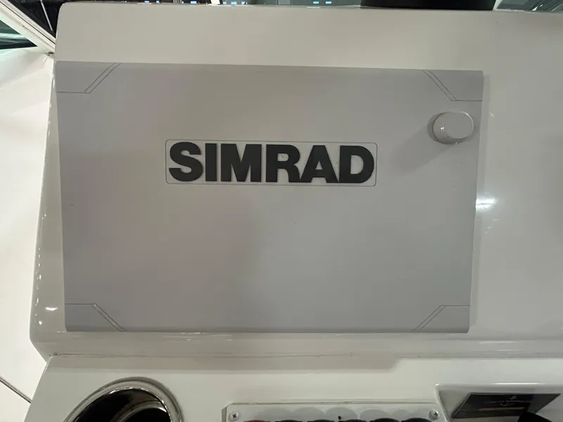 Slide: The Image of Simrad panel on 2019 Albemarle 27 Dual Console boat dashboard. - 23