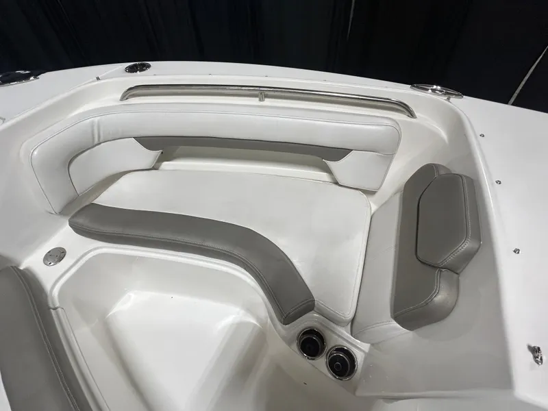 Slide: The Image of 2019 Albemarle 27 Dual Console boat interior with white and gray seating. - 37