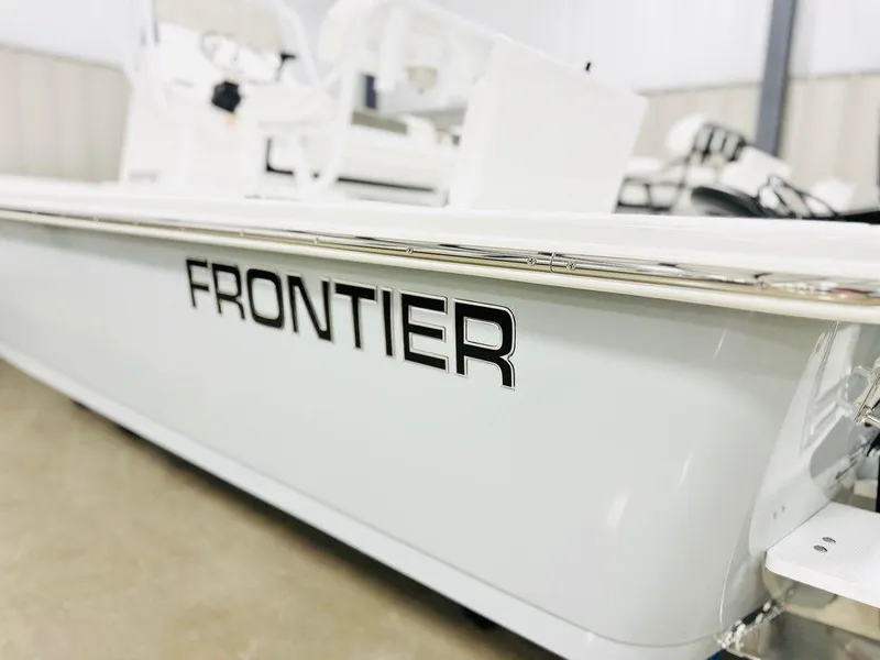 Slide: The Image of 2025 Frontier 2104 boat, sleek white design with bold branding. - 12