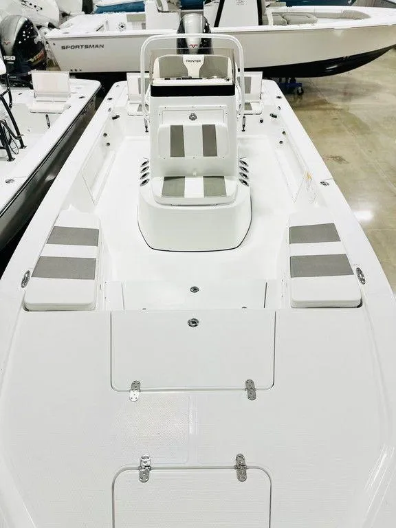 Slide: The Image of 2025 Frontier 2104 boat interior with seating and storage compartments. - 6
