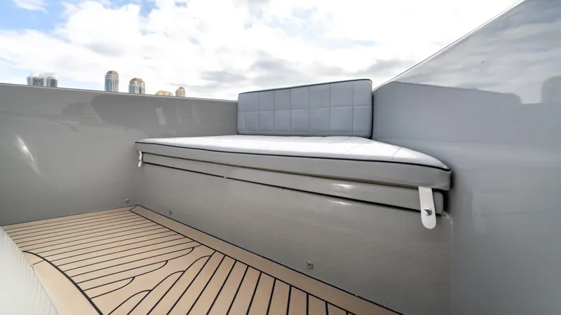Slide: The Image of 2024 Pardo Yachts 43, sleek deck with cushioned seating, modern design. - 33