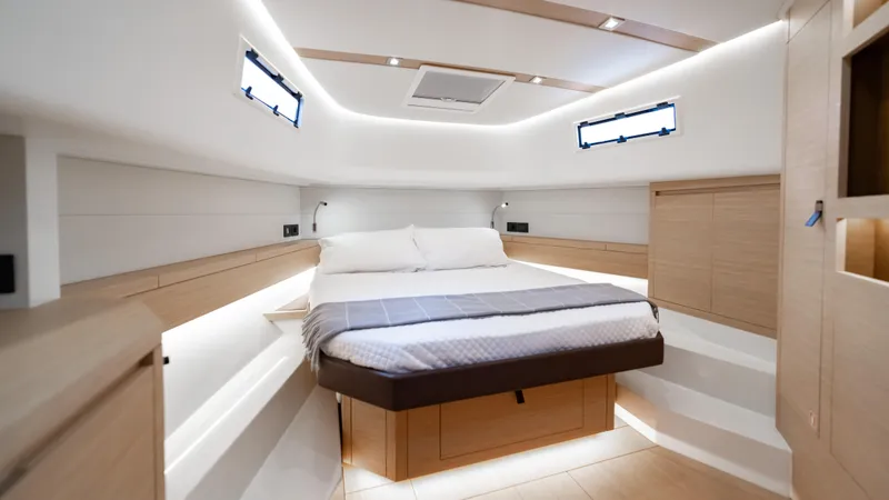 Slide: The Image of Luxurious cabin interior of 2024 Pardo Yachts 43, featuring a cozy bed and modern design. - 35