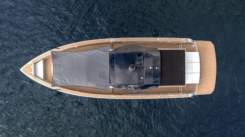 Slide: The Image of 2024 Pardo Yachts 43, aerial view, sleek design, wooden deck, luxury motor yacht. - 6