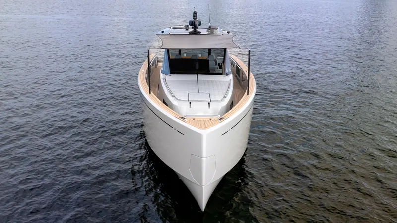 Slide: The Image of 2024 Pardo Yachts 43 on calm water, showcasing sleek design and modern features. - 8