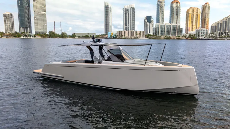 Slide: The Image of 2024 Pardo Yachts 43 on water with city skyline backdrop. - 9