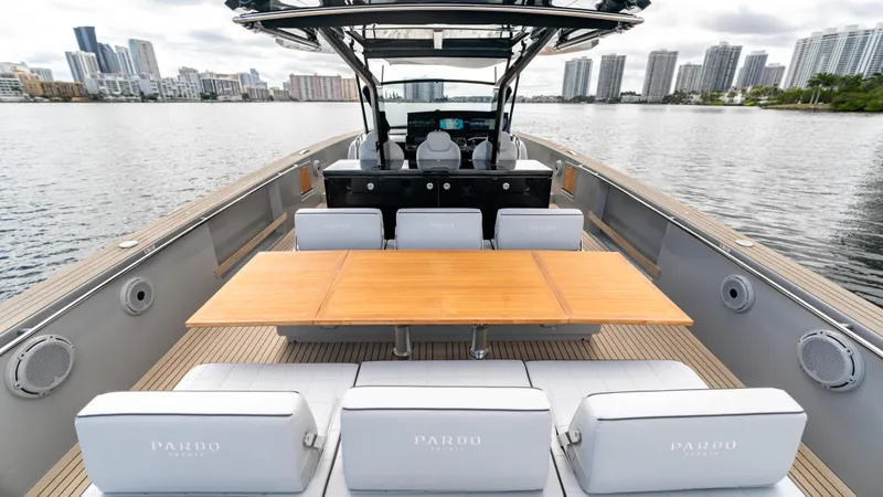 Slide: The Image of 2024 Pardo Yachts 43 luxury yacht interior with city skyline in background. - 19