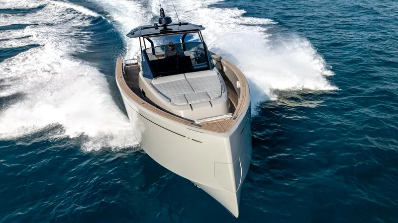 Slide: The Image of 2024 Pardo Yachts 43 cruising on open water, showcasing sleek design and powerful performance. - 2