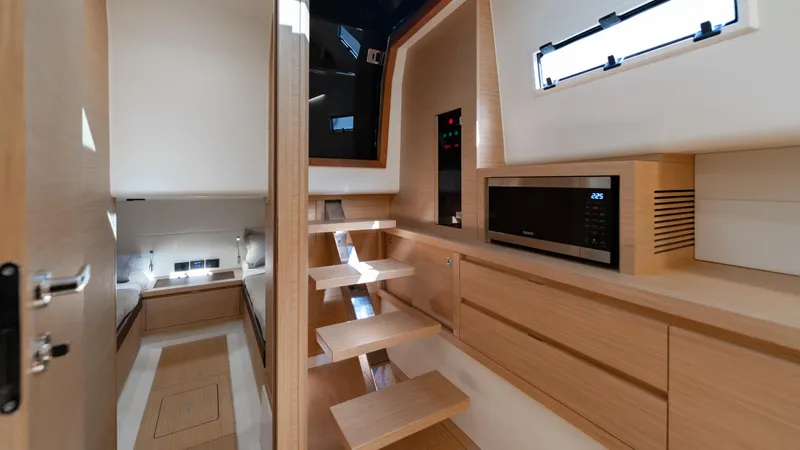 Slide: The Image of Luxurious interior of 2024 Pardo Yachts 43, featuring modern wood finishes and sleek design. - 40
