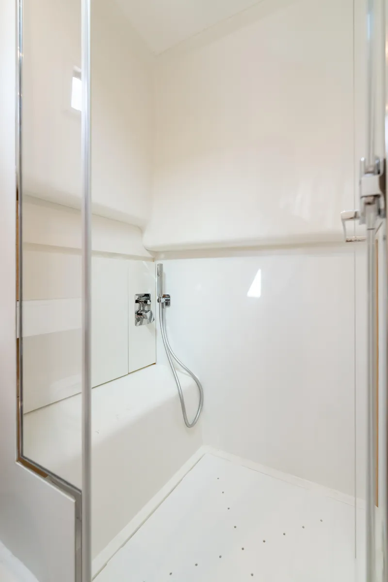 Slide: The Image of 2024 Pardo Yachts 43 shower area with sleek, modern design and chrome fixtures. - 45