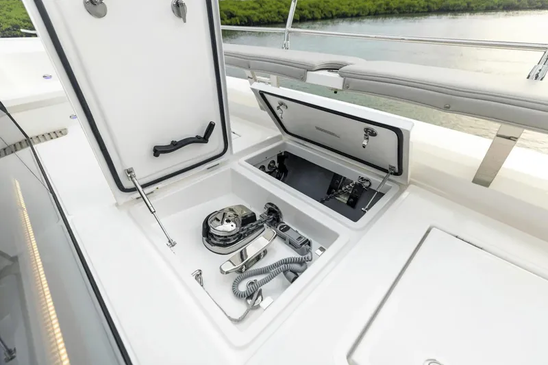 Slide: The Image of Storage compartments on the 2026 Aquila 50 Yacht deck, featuring modern equipment. - 13