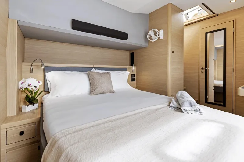 Slide: The Image of Luxurious bedroom interior of 2026 Aquila 50 Yacht with modern design and elegant decor. - 43