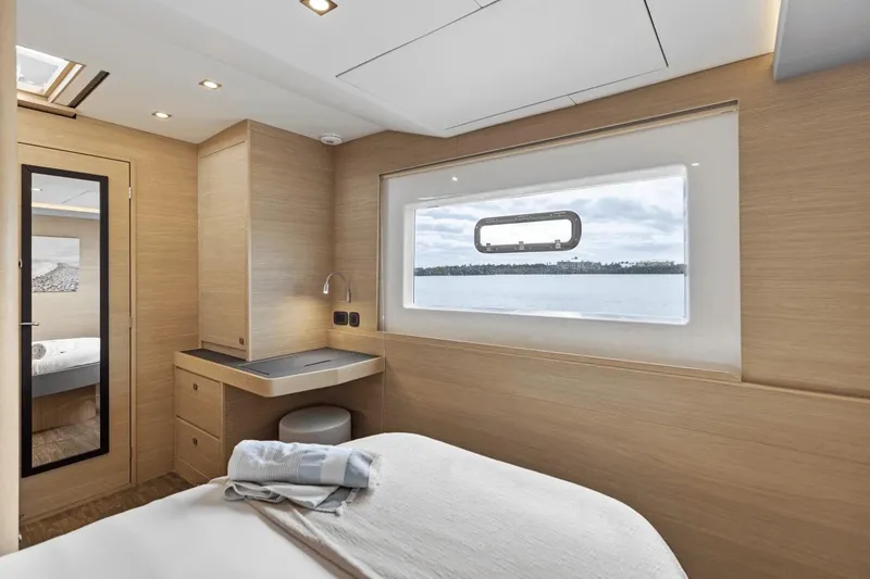 Slide: The Image of Luxurious cabin interior of 2026 Aquila 50 Yacht with scenic window view. - 44