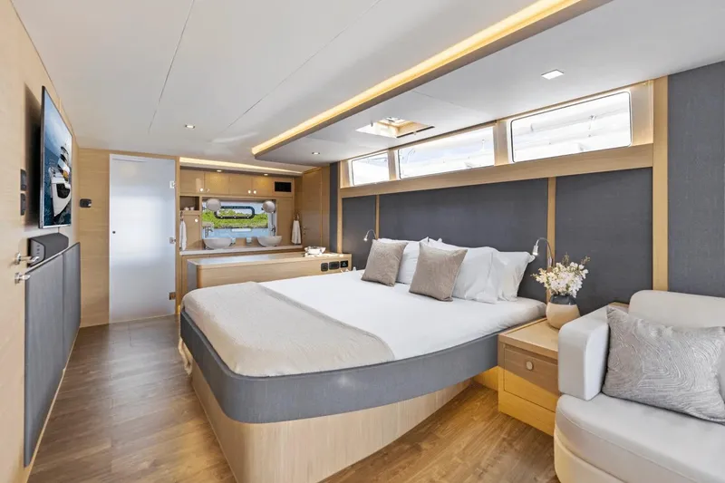 Slide: The Image of Luxurious interior of 2026 Aquila 50 Yacht with modern bedroom design. - 49