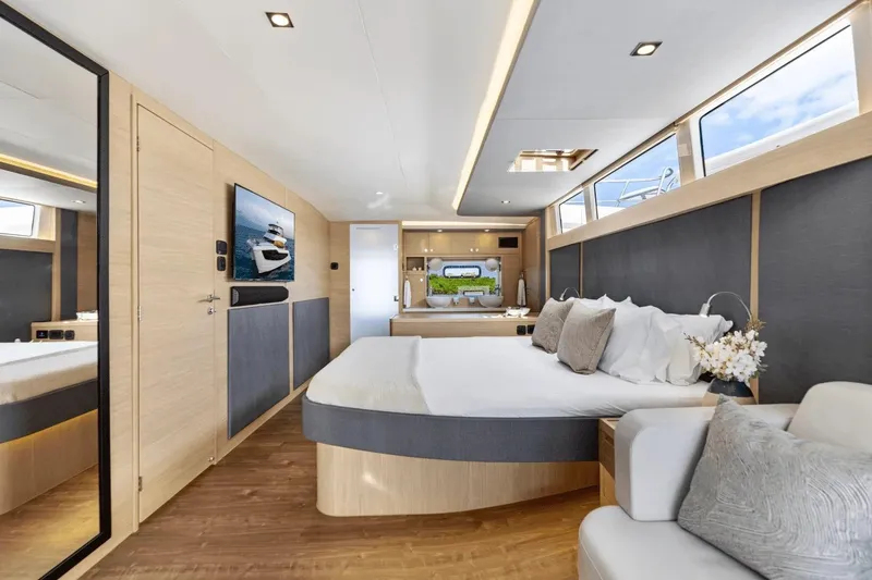 Slide: The Image of Luxurious interior of 2026 Aquila 50 Yacht with modern bedroom design. - 50