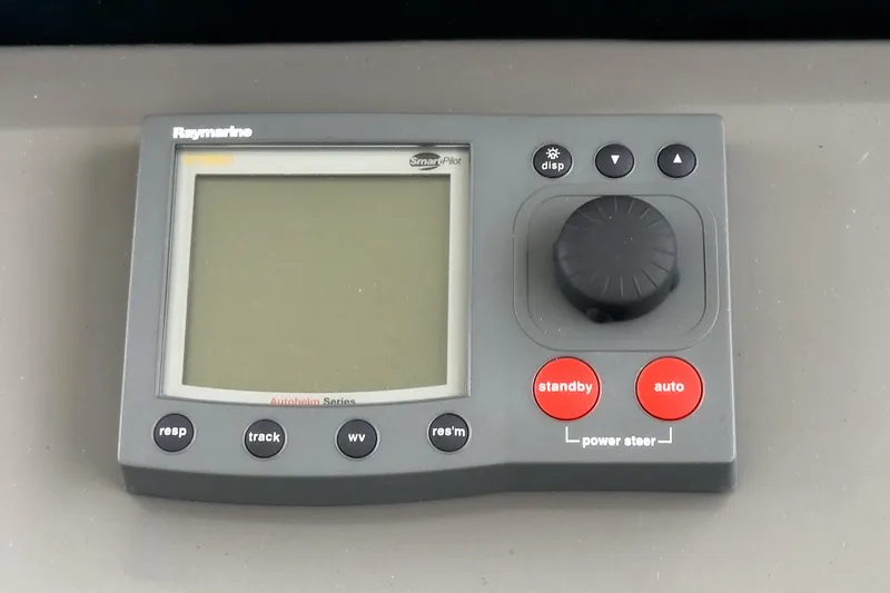 Slide: The Image of Raymarine autopilot control panel on 2006 Cruisers 415 boat. - 15