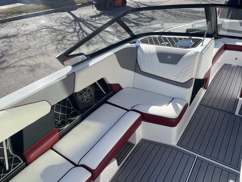Slide: The Image of 2022 Nautique Super Air Nautique GS22 interior with white and red seating. - 12