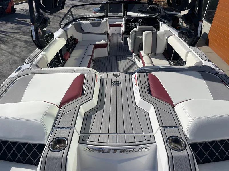 Slide: The Image of 2022 Nautique Super Air Nautique GS22 interior with luxurious seating and modern design. - 6