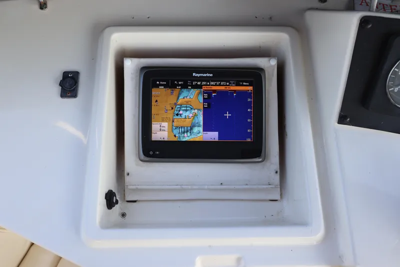 Slide: The Image of Raymarine navigation display on 1990 Hatteras 40 Double Cabin yacht dashboard. - 23