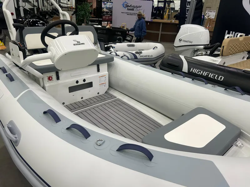 Slide: The Image of 2025 Highfield Classic 400 inflatable boat interior at a marine exhibition. - 3
