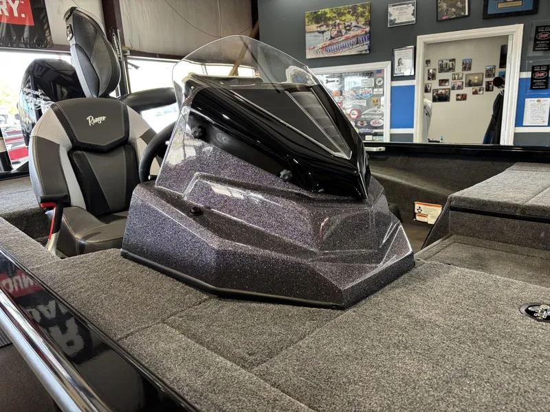 Slide: The Image of 2025 Ranger ALPHA 208 boat interior with sleek console and comfortable seating. - 3