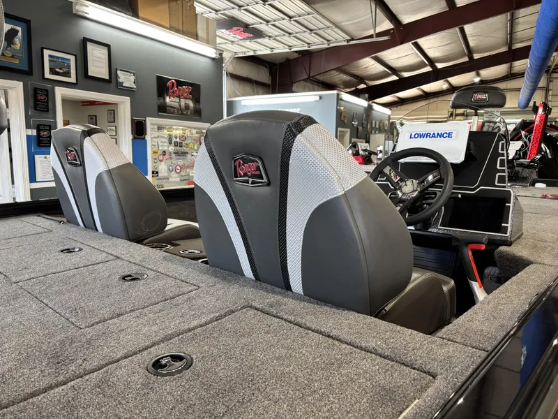 Slide: The Image of 2025 Ranger ALPHA 208 boat interior with dual seats and Lowrance electronics. - 5