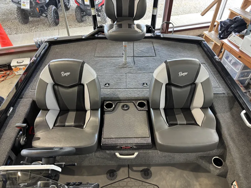 Slide: The Image of Interior of 2025 Ranger ALPHA 208 boat with dual seats and steering console. - 7