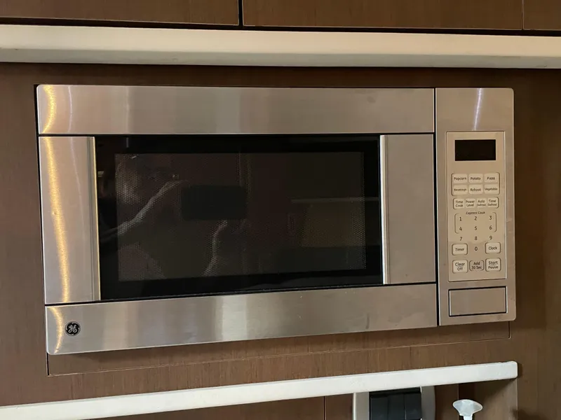 Slide: The Image of Built-in microwave in 2014 Sea Ray 330 Sundancer yacht kitchen. - 10