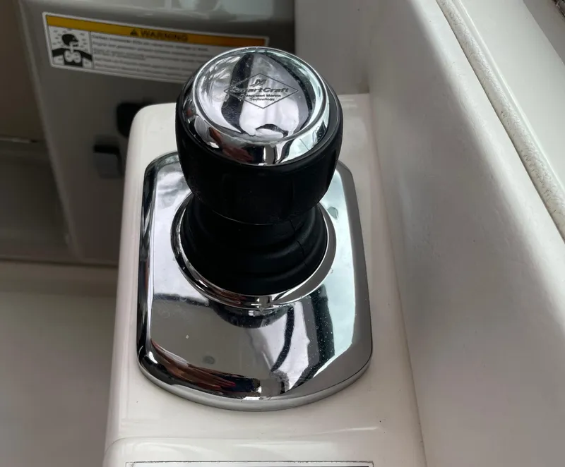 Slide: The Image of Joystick control on a 2014 Sea Ray 330 Sundancer boat. - 7