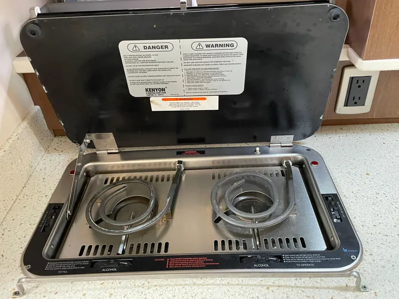 Slide: The Image of Built-in stove on 2014 Sea Ray 330 Sundancer yacht kitchen counter. - 9