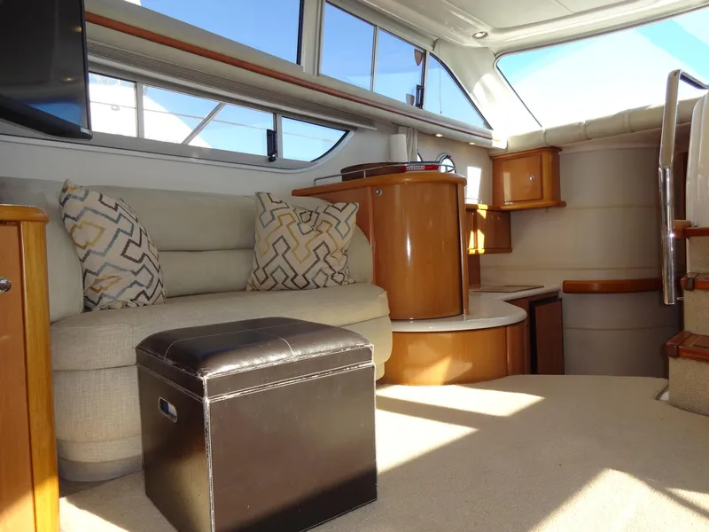 Slide: The Image of Interior of 1999 Sealine F44 yacht with modern furnishings and natural light. - 30
