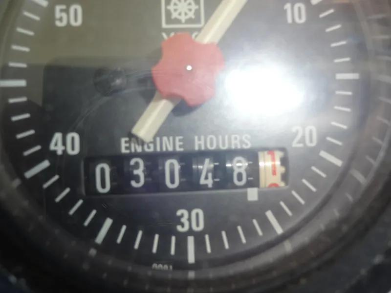 Slide: The Image of Close-up of a Sealine F44 engine hour meter showing 3048 hours. - 36