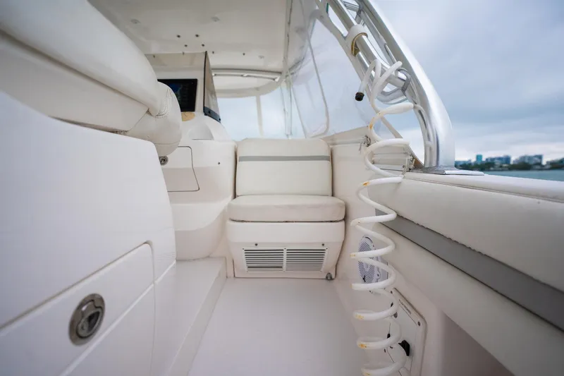 Slide: The Image of 2016 Intrepid 400 Cuddy interior with white seating and modern design. - 34