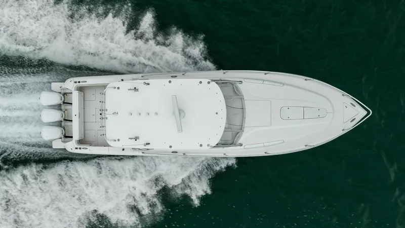 Slide: The Image of Aerial view of 2016 Intrepid 400 Cuddy boat cruising on water. - 6