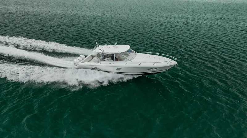 Slide: The Image of 2016 Intrepid 400 Cuddy cruising on open water. - 7