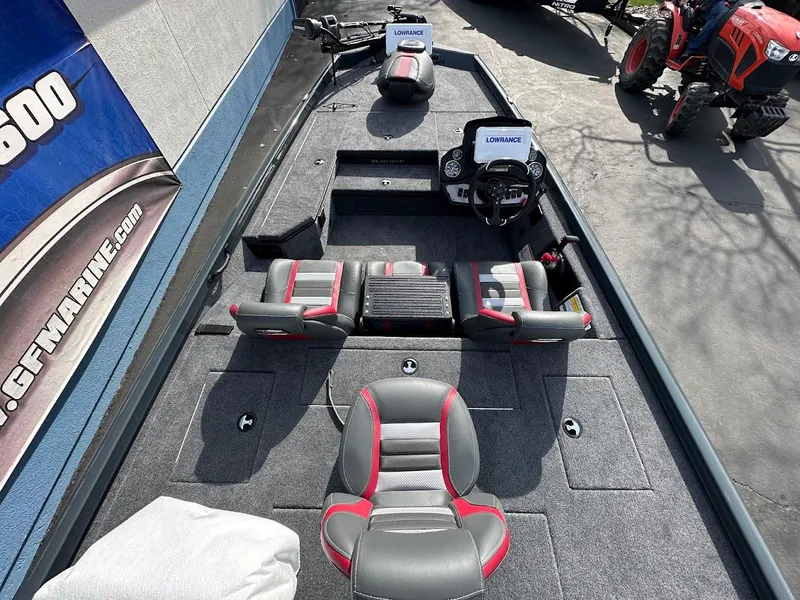 Slide: The Image of 2025 Ranger RT178 boat interior with seating and steering console. - 11