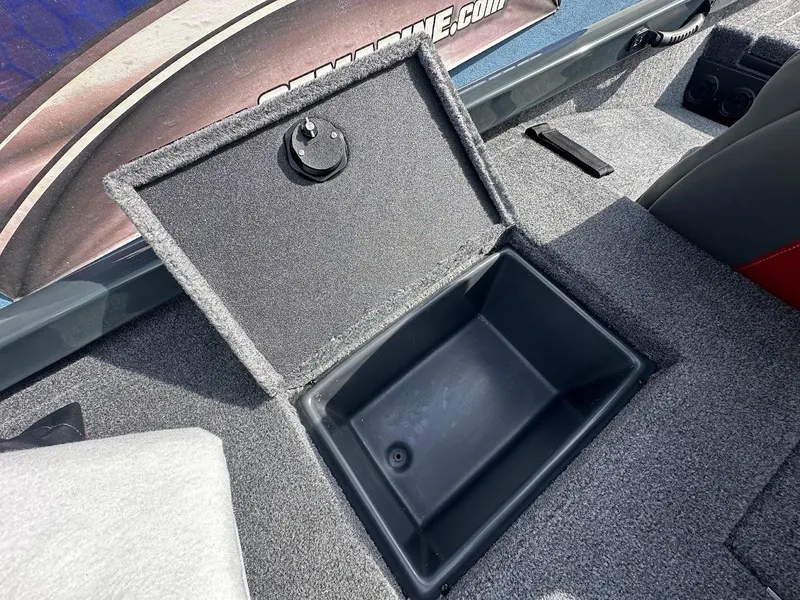 Slide: The Image of 2025 Ranger RT178 boat storage compartment with open lid, showcasing interior space. - 32