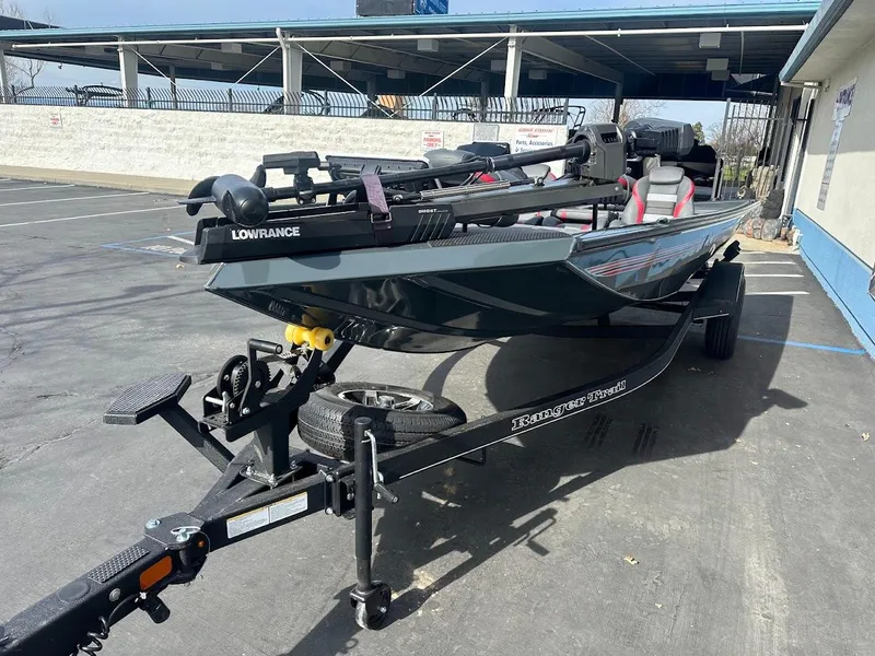 Slide: The Image of 2025 Ranger RT178 boat on trailer in parking lot. - 4
