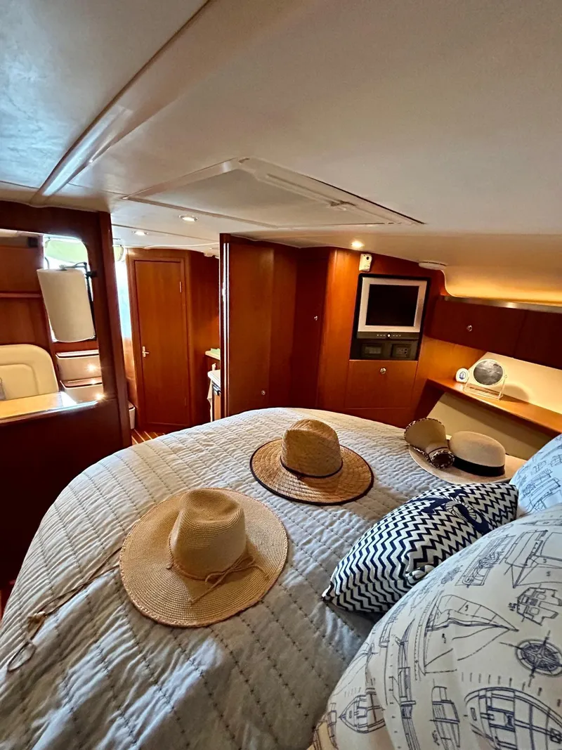 Slide: The Image of Interior of 2007 Open TIARA 36 yacht with cozy bedroom and stylish decor. - 19