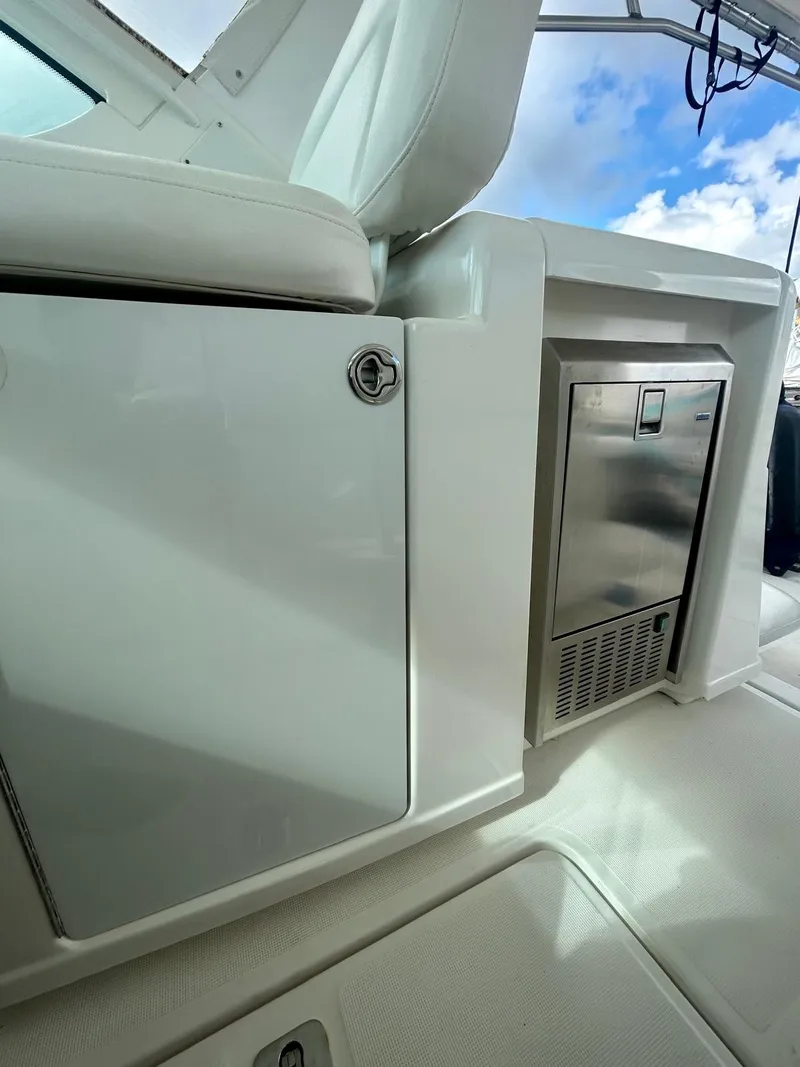 Slide: The Image of 2007 TIARA 36 OPEN yacht interior with sleek cabinetry and stainless steel appliance. - 4