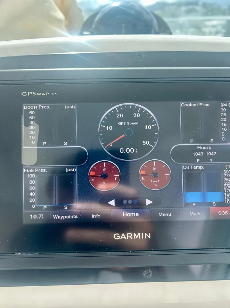 Slide: The Image of Garmin GPS display on 2007 Open TIARA 36 boat, showing speed and engine metrics. - 6
