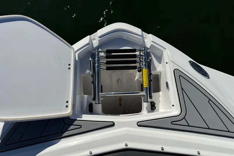 Slide: The Image of Bow storage compartment with ladder on 2025 Monterey M4 boat. - 13