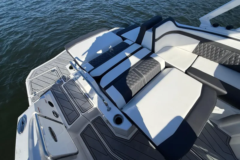 Slide: The Image of Luxury seating on 2025 Monterey M4 boat, featuring sleek design and water backdrop. - 21