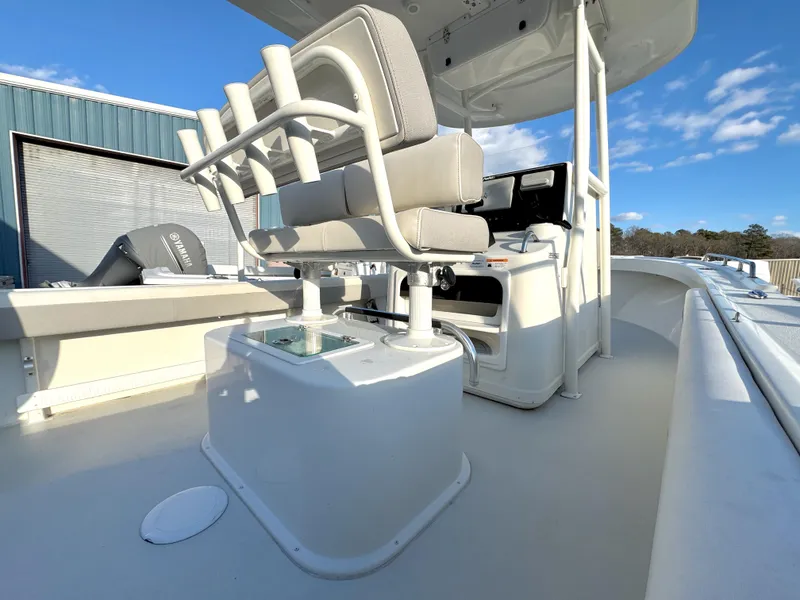 Slide: The Image of 2020 Parker 2300 Special Edition boat interior with seating and control console. - 11
