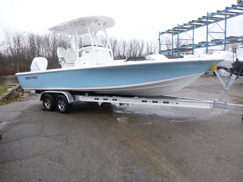 The Image of 2025 Sea Pro 250 Bay boat on trailer at Grand Pointe Marina. - 0