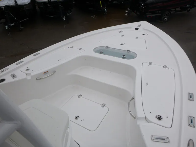 Slide: The Image of 2025 Sea Pro 250 Bay boat emblem on white surface. - 15