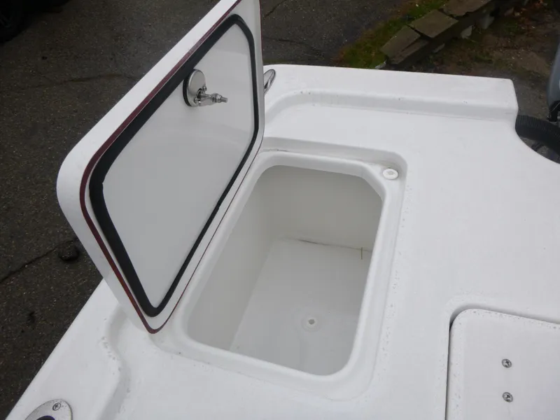 Slide: The Image of 2025 Sea Pro 250 Bay boat cockpit with steering wheel and control panel. - 9