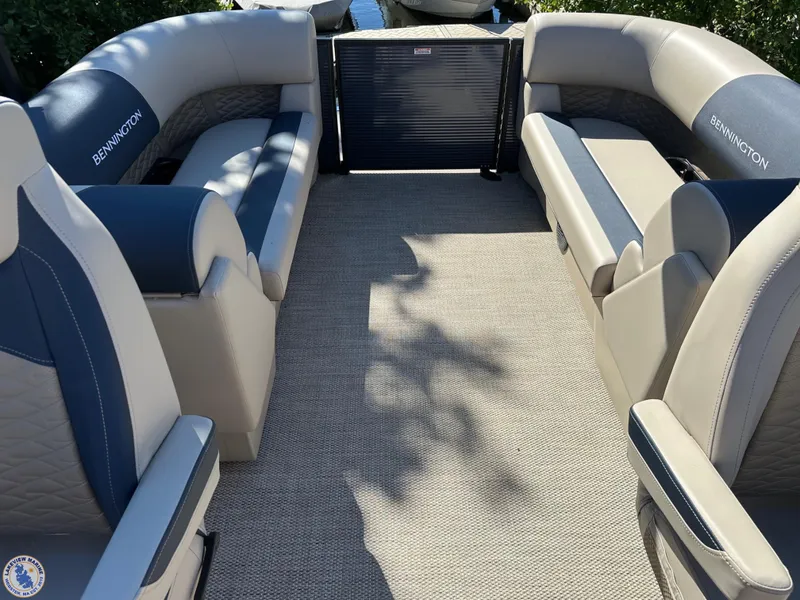 Slide: The Image of 2024 Bennington 22 SSR boat interior with plush seating and spacious layout. - 2