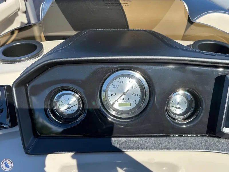 Slide: The Image of Dashboard of 2024 Bennington 22 SSR boat with gauges and cup holders. - 5