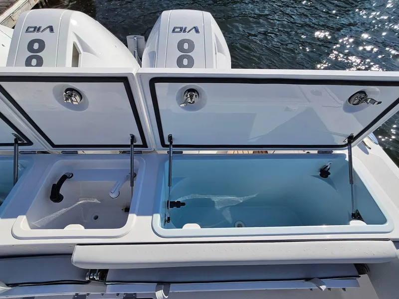 Slide: The Image of 2025 Southport 38 FE boat on water with triple outboard engines. - 4