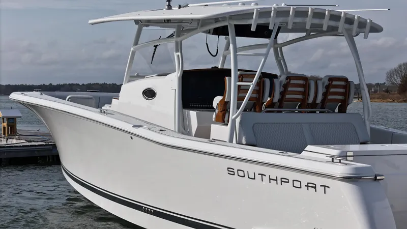 Slide: The Image of 2025 Southport 38 FE boat helm with modern controls and dual screens. - 47
